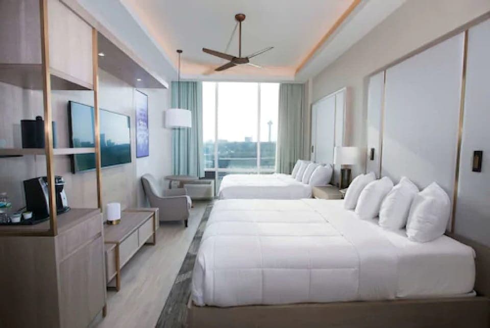 Desk, laptop workspace, iron/ironing board, free cribs/infant beds