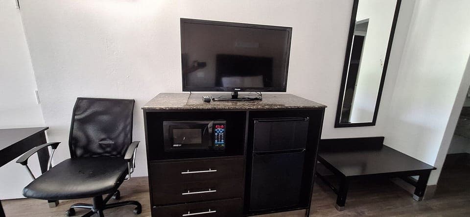 Premium bedding, desk, blackout drapes, iron/ironing board