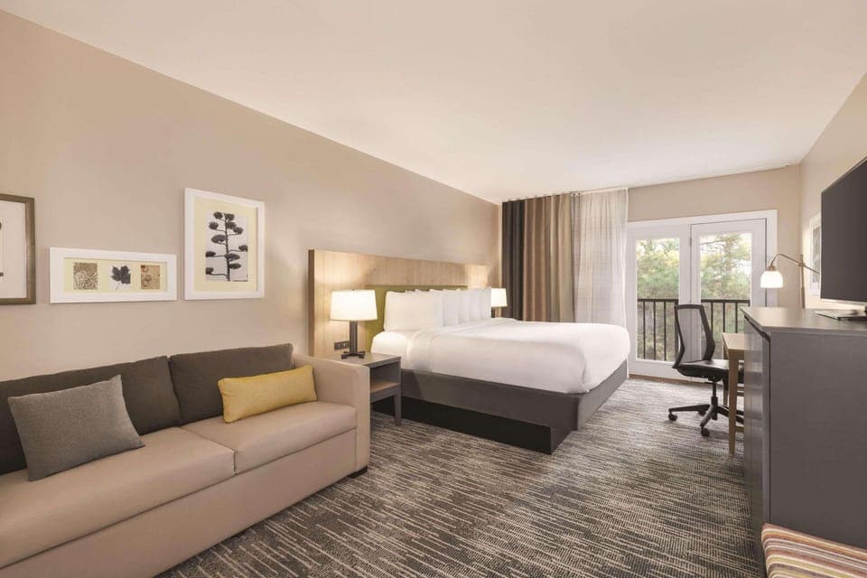 Hypo-allergenic bedding, desk, blackout drapes, soundproofing