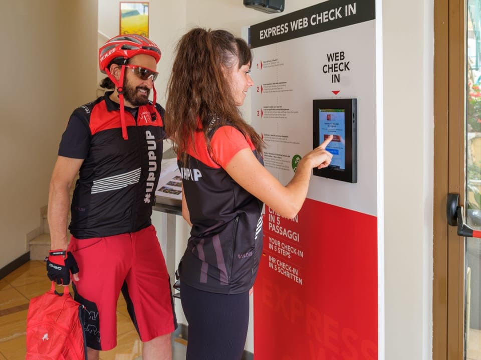 Check-in/check-out kiosk