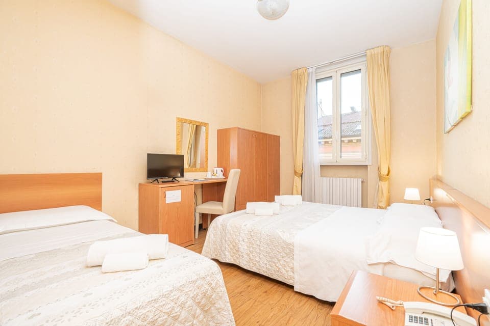 Triple Room | Down comforters, minibar, in-room safe, desk