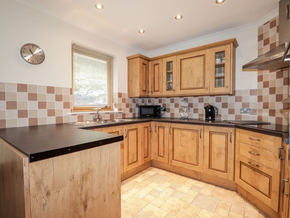 Cottage | Private kitchen | Stovetop, dishwasher, highchair, cookware/dishes/utensils