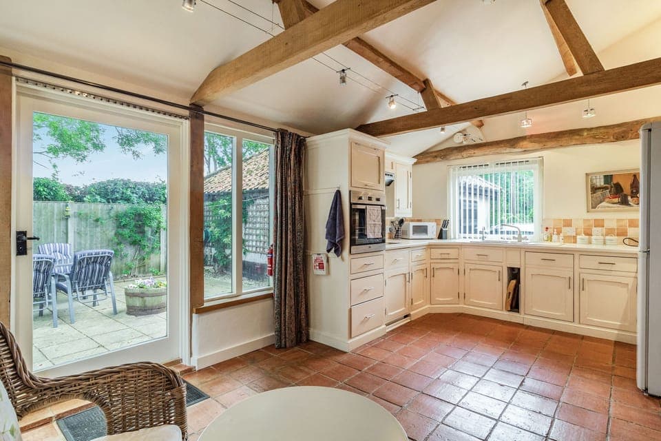 Cottage | Private kitchen | Stovetop, dishwasher, highchair, cookware/dishes/utensils