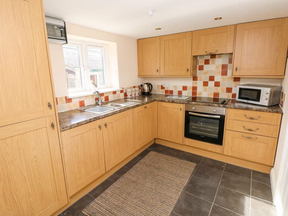 Cottage | Private kitchen | Fridge, dishwasher, highchair, cookware/dishes/utensils