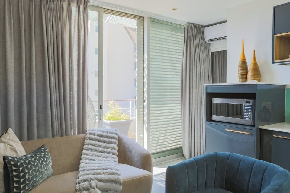 Junior Penthouse | Living area | Flat-screen TV