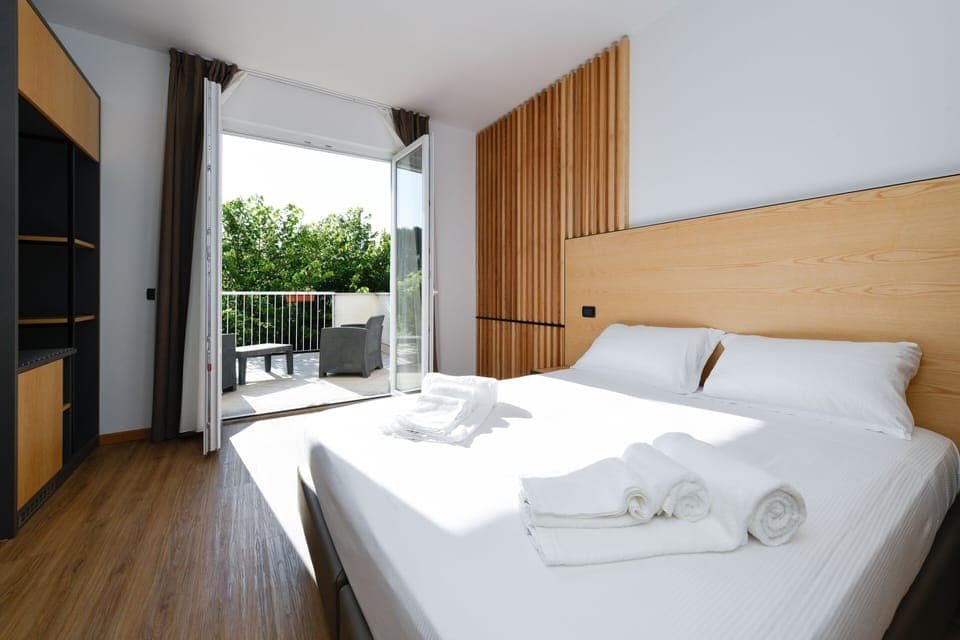 Hypo-allergenic bedding, down comforters, memory foam beds, in-room safe