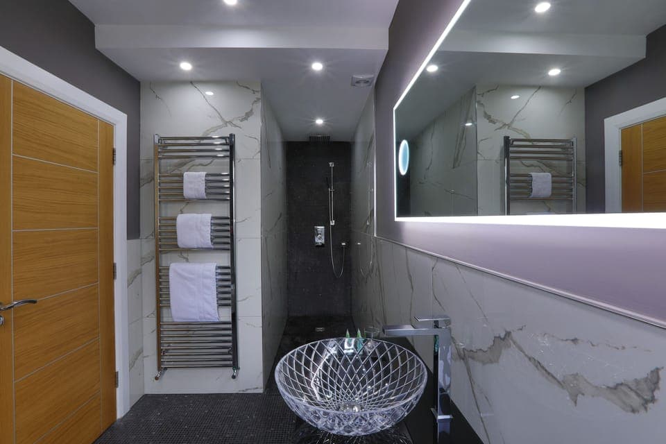 Knocklayde - king room | Bathroom | Shower, rainfall showerhead, designer toiletries, hair dryer