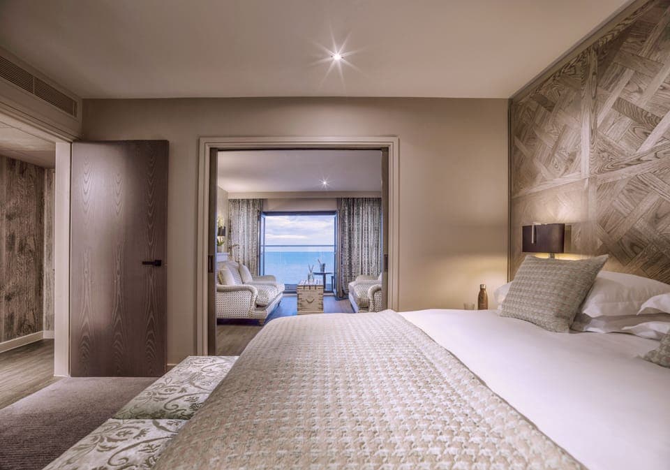 Suite, 1 King Bed, Sea View | In-room safe, desk, laptop workspace, blackout drapes