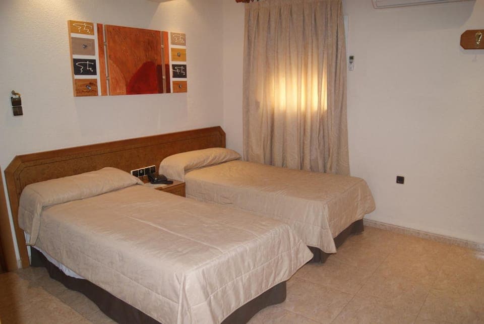 Desk, free WiFi, bed sheets