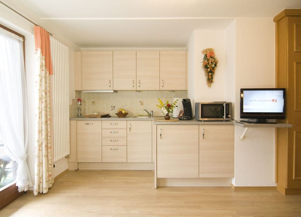 Apartment, 2 Bedrooms, Balcony | Private kitchen | Full-size fridge, microwave, stovetop, dishwasher
