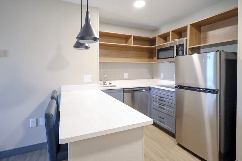 Studio Suite, 1 King Bed (Dining Area) | Private kitchen | Fridge, microwave, stovetop, coffee/tea maker