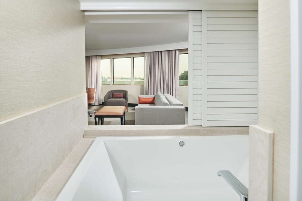 Suite, 1 Bedroom, Jetted Tub | In-room safe, desk, laptop workspace, blackout drapes