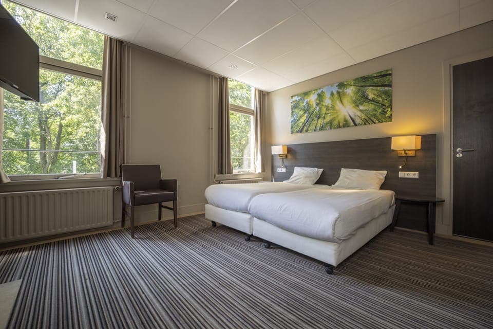 Standard Double Room (with Shower) | Desk, blackout drapes, iron/ironing board, cribs/infant beds