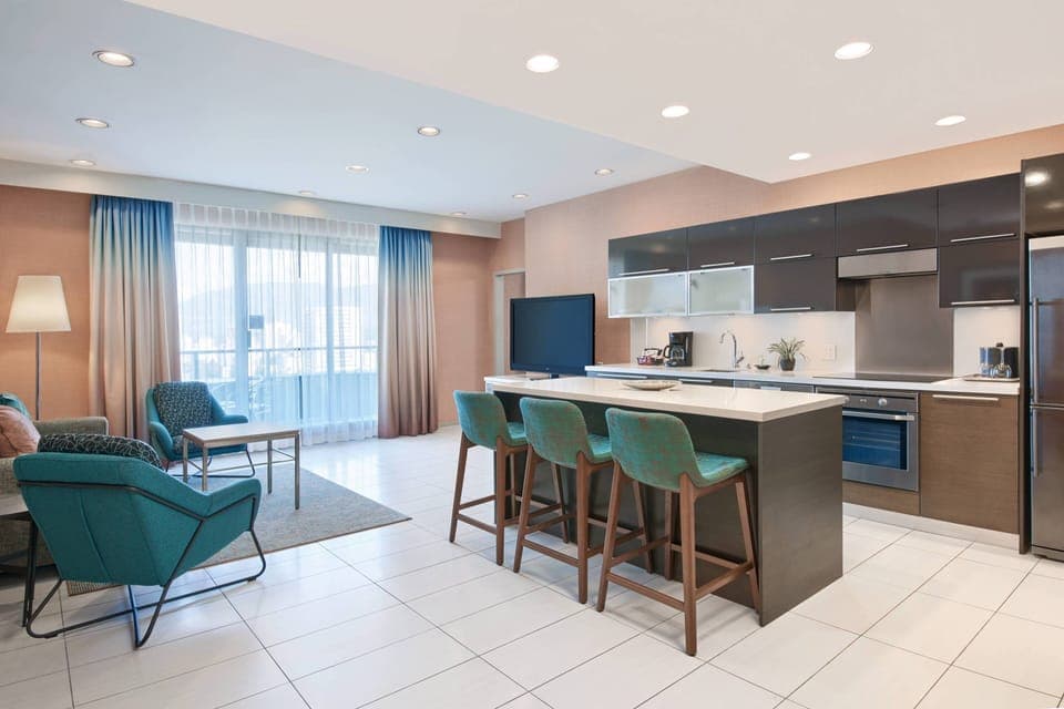 Suite, 1 Bedroom | Private kitchen | Full-size fridge, microwave, stovetop, dishwasher