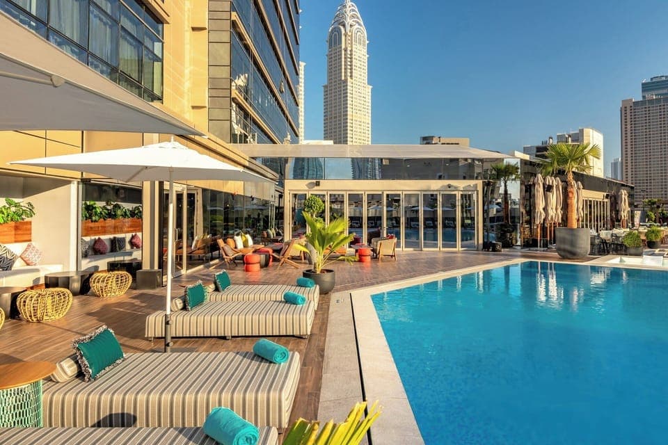 Outdoor pool, pool umbrellas, sun loungers