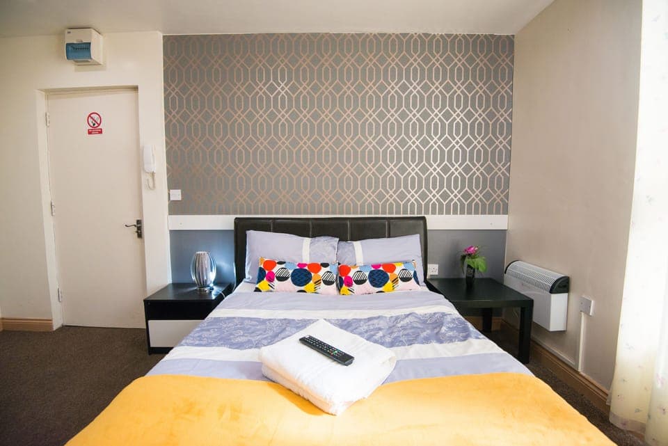 Studio, 1 Double Bed | Living area | Flat-screen TV