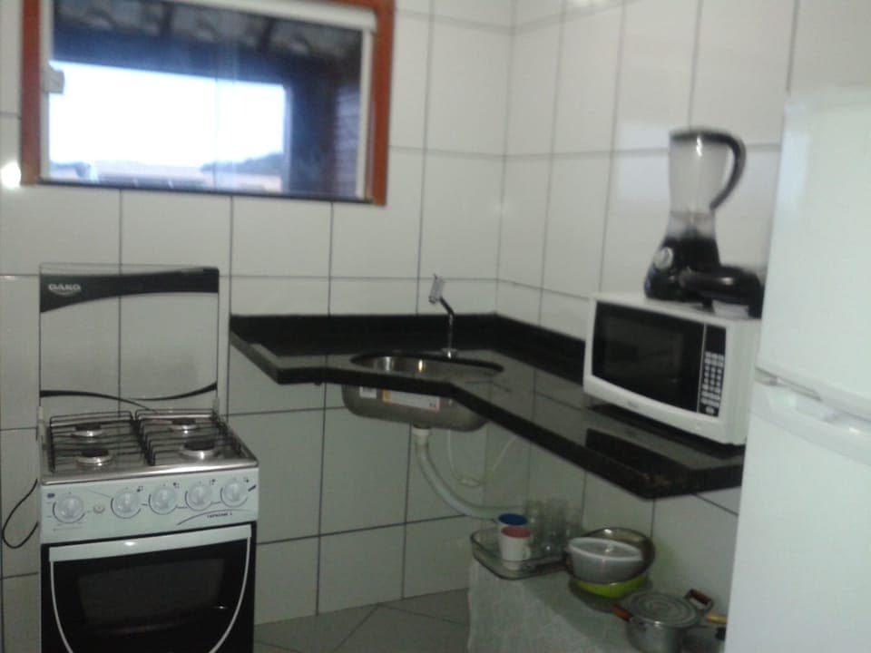 Basic Apartment, Multiple Beds, Non Smoking | Private kitchen | Fridge, microwave, oven, stovetop