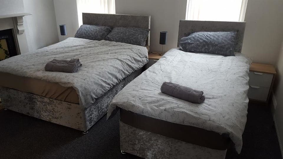 Family Room, Private Bathroom | Free WiFi, bed sheets