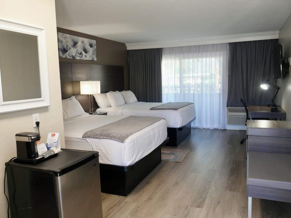 Standard Room, 2 Queen Beds, Non Smoking, Balcony | Pillowtop beds, desk, blackout drapes, iron/ironing board