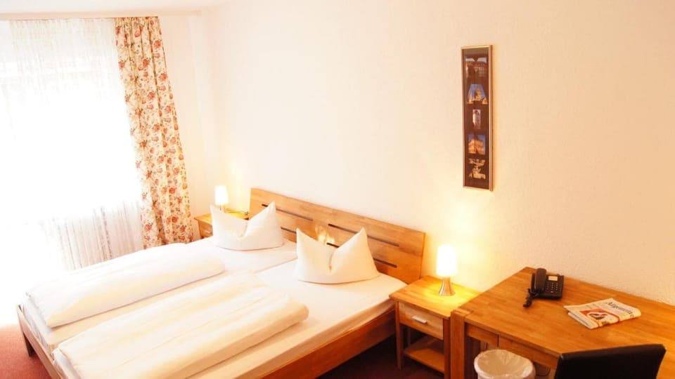 Desk, free WiFi, bed sheets