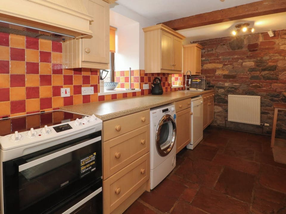 Microwave, stovetop, dishwasher, cookware/dishes/utensils