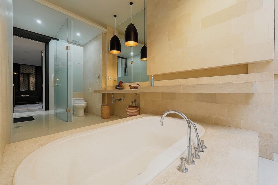 Villa | Bathroom | Rainfall showerhead, free toiletries, hair dryer, bathrobes