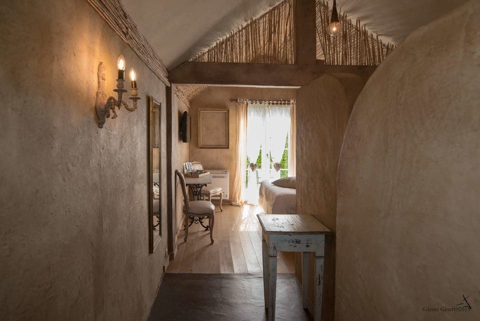 Double Room (Terre) | Blackout drapes, iron/ironing board, free WiFi, bed sheets