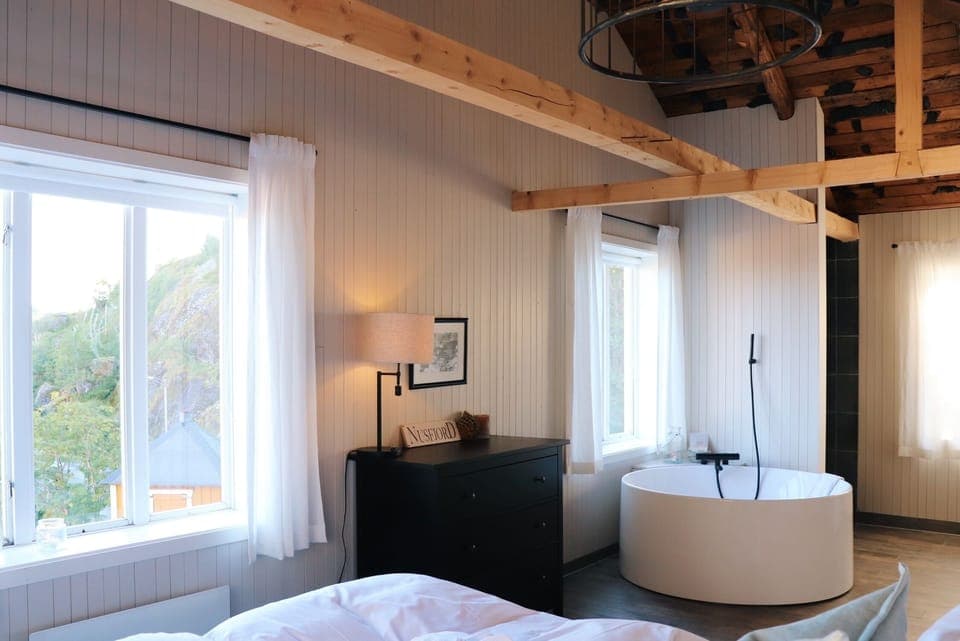 Shower, designer toiletries, hair dryer, bathrobes