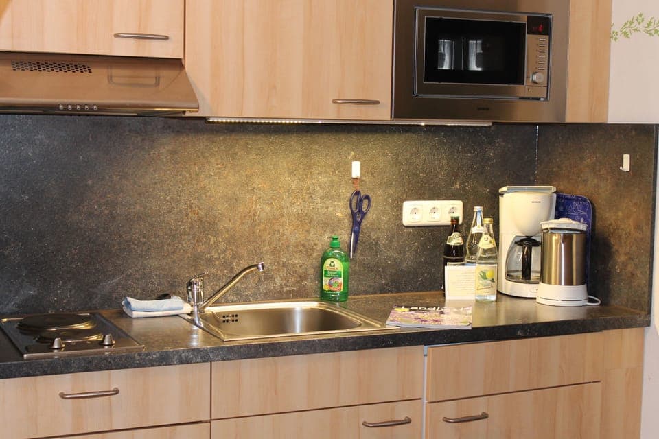 Apartment, 1 Bedroom (3 Adults) | Private kitchen | Fridge, microwave, stovetop, electric kettle