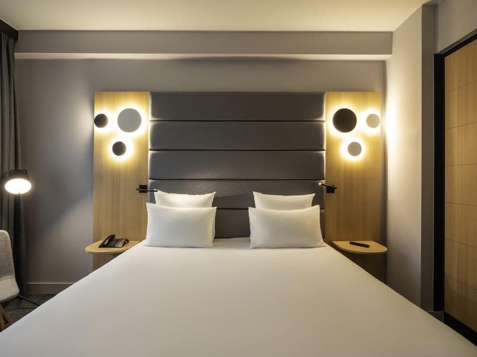 Premium bedding, down comforters, minibar, in-room safe