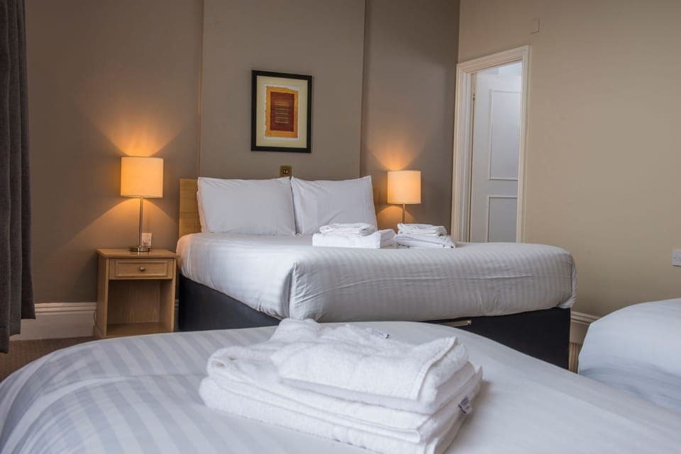 Family Room | Desk, iron/ironing board, free WiFi, bed sheets