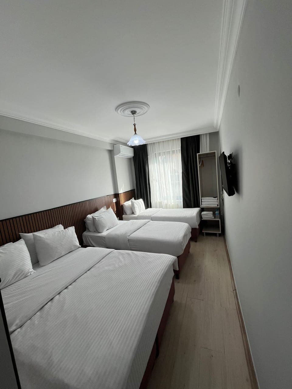Basic Quadruple Room | Premium bedding, soundproofing, free WiFi, bed sheets