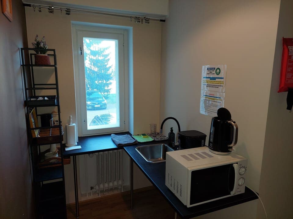 Full-size fridge, microwave, electric kettle