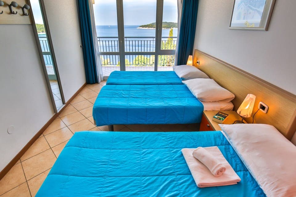 Apartment, 1 Bedroom, Balcony, Sea View (3+2) | In-room safe, desk, blackout drapes, bed sheets