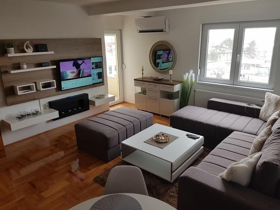 Comfort Apartment, Terrace, Beach View | Living room | 50-inch Smart TV with cable channels, TV