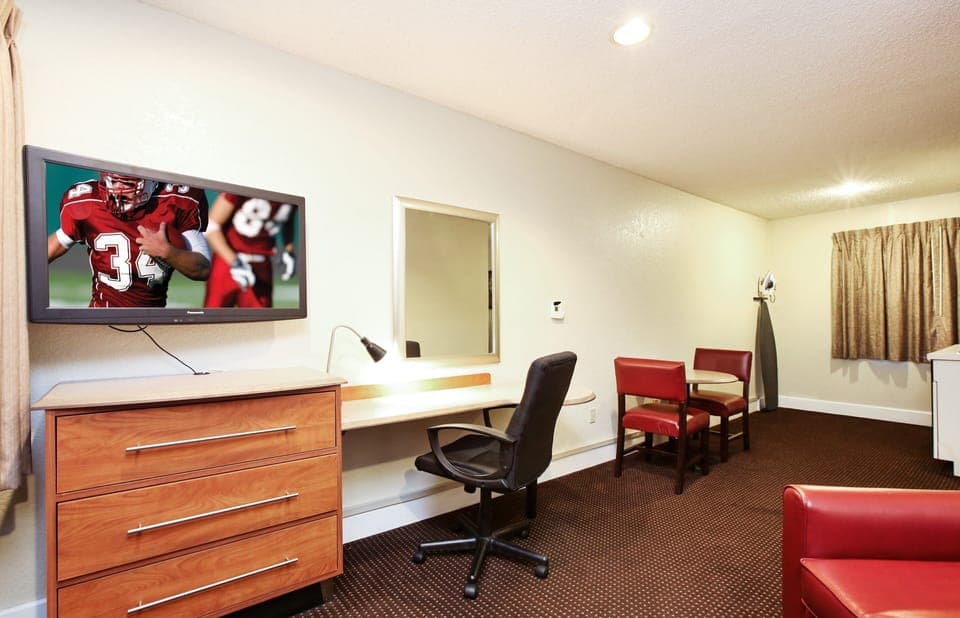 Suite, 1 King Bed, Non Smoking | Desk, laptop workspace, blackout drapes, free cribs/infant beds