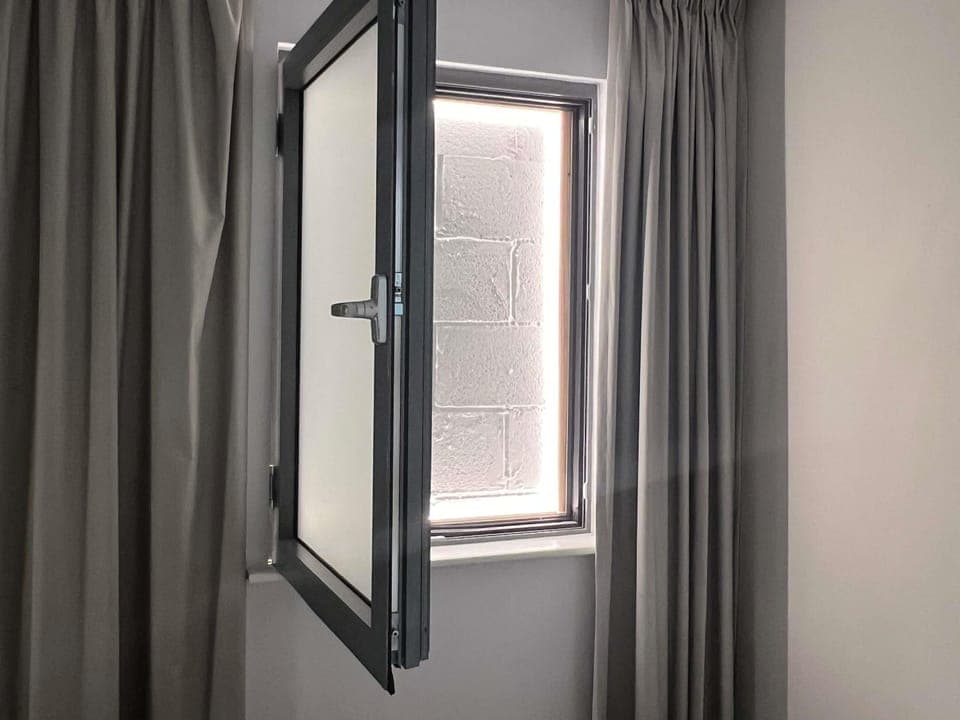 Blackout drapes, soundproofing, travel crib, free WiFi