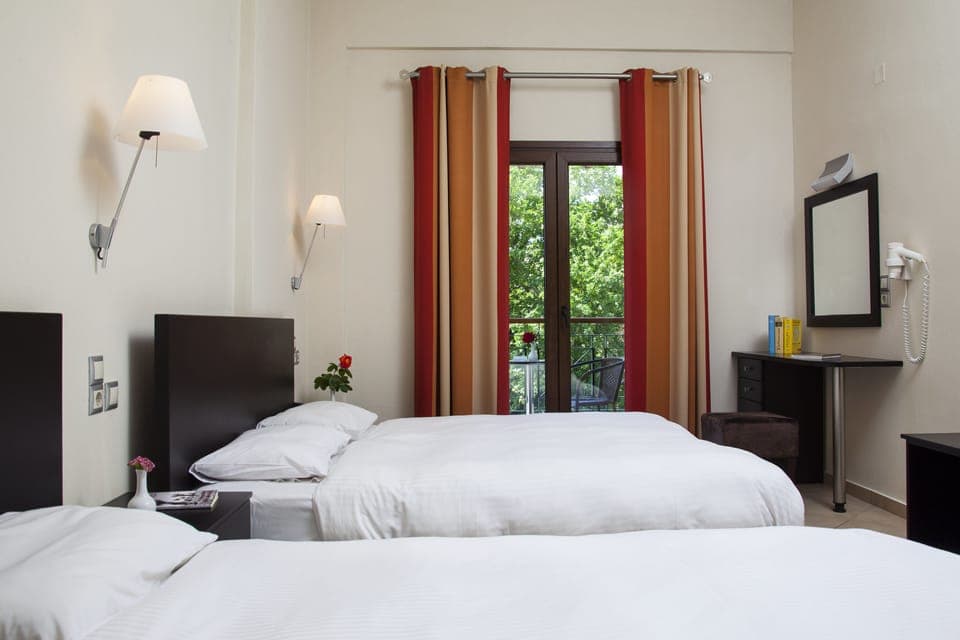 Deluxe Triple Room (Meteora View) | Pillowtop beds, in-room safe, individually furnished, blackout drapes