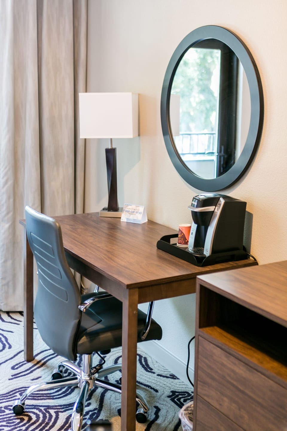 Desk, blackout drapes, soundproofing, iron/ironing board