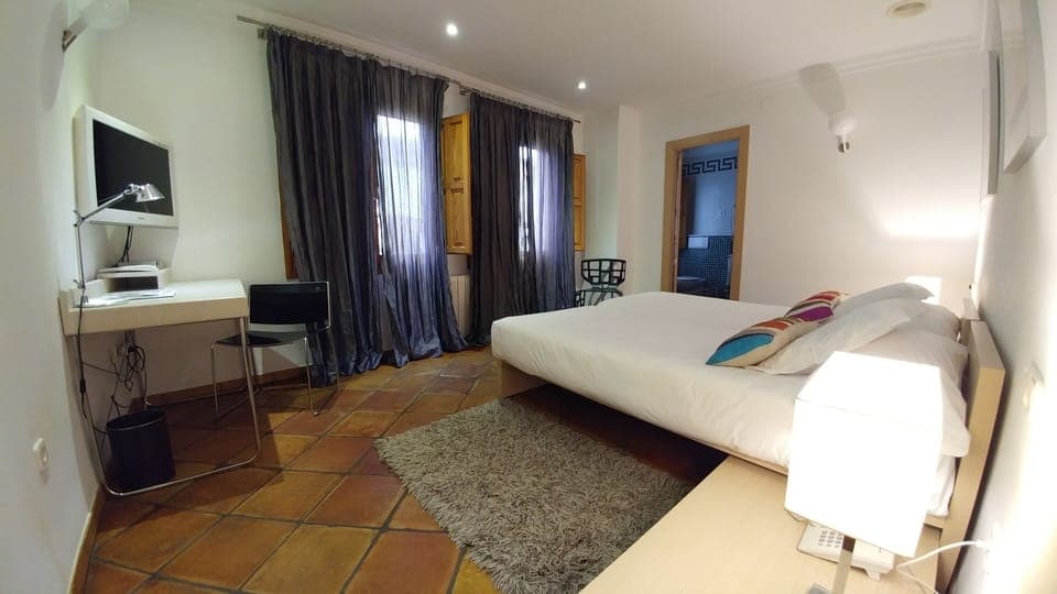Double Room | Minibar, in-room safe, individually decorated, desk