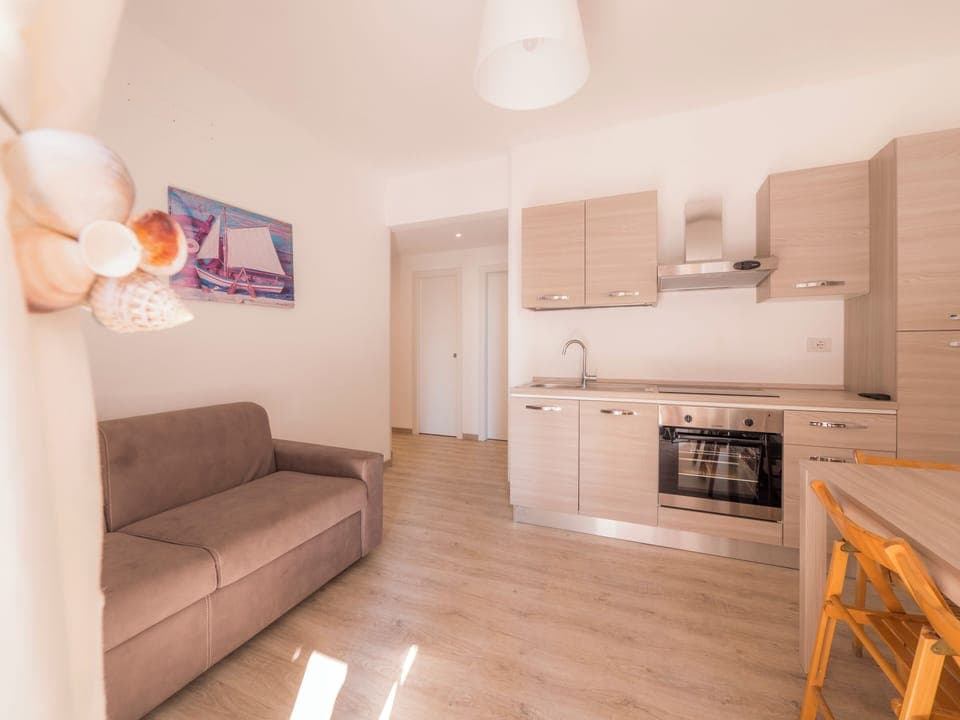 Apartment, Terrace | Living area | 32-inch flat-screen TV with digital channels