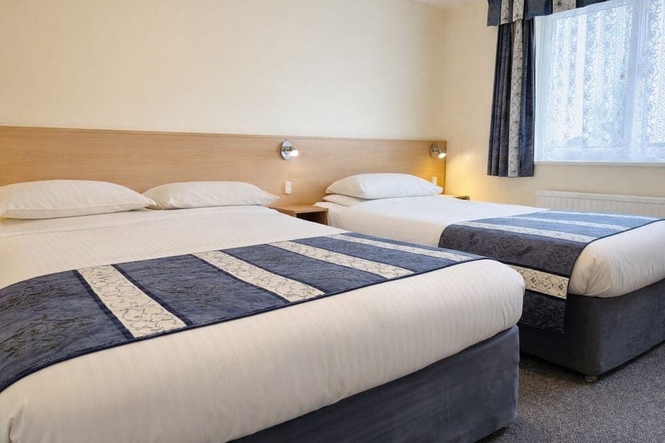 Family Room | Individually decorated, iron/ironing board, free WiFi, bed sheets