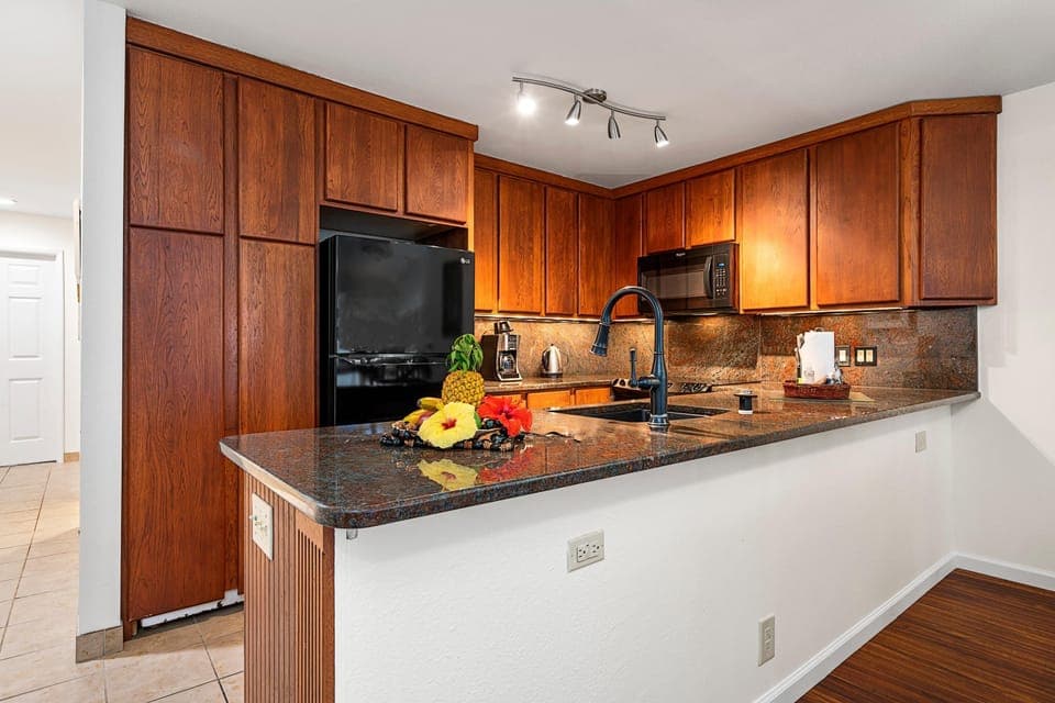 Condo, 1 Queen Bed with Sofa bed (Sea Village 4-205) | Private kitchen | Fridge, microwave, oven, stovetop