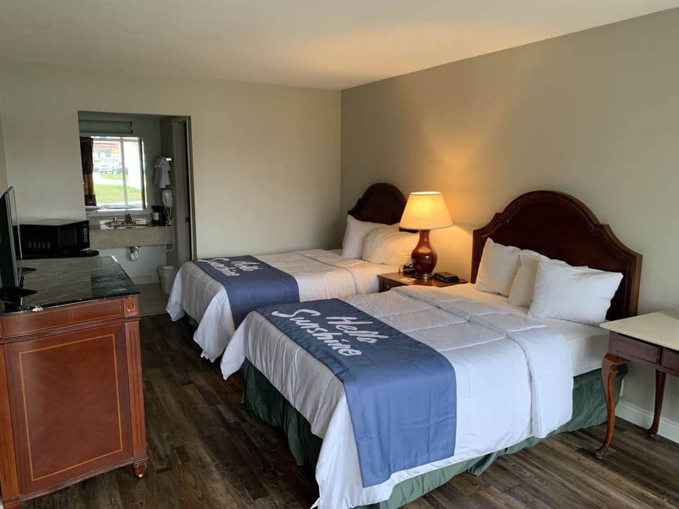 Double Room, 2 Double Beds | In-room safe, desk, iron/ironing board, free cribs/infant beds