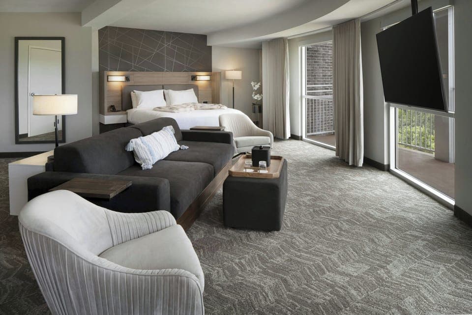 Desk, laptop workspace, iron/ironing board, cribs/infant beds