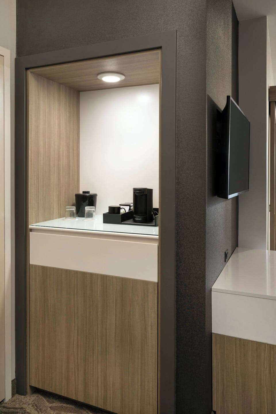 Desk, laptop workspace, iron/ironing board, cribs/infant beds