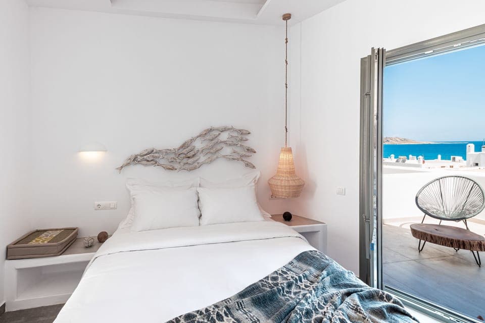 Deluxe Double Room, Sea View | Premium bedding, minibar, in-room safe, individually decorated