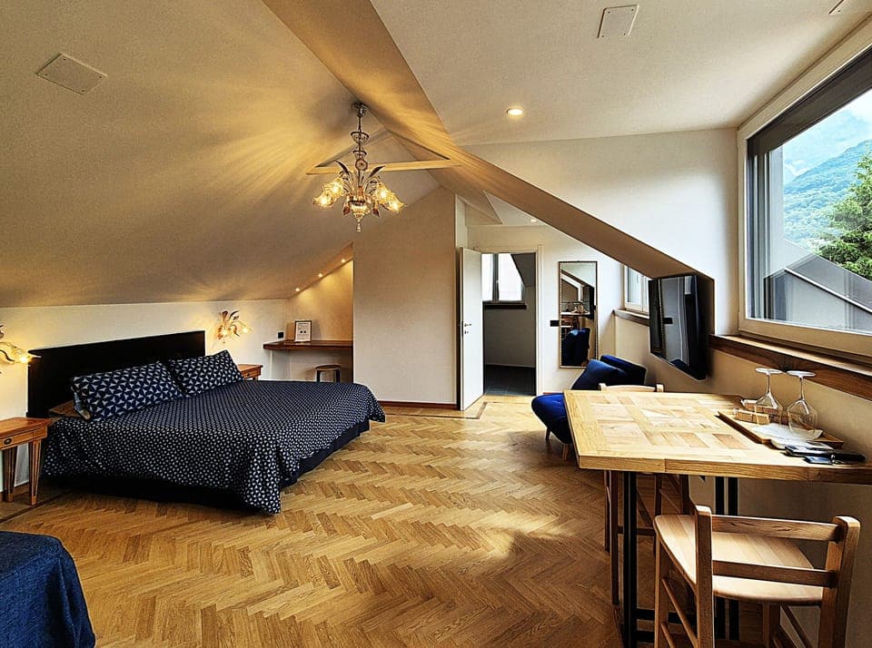 Deluxe Triple Room | Down comforters, minibar, blackout drapes, free WiFi