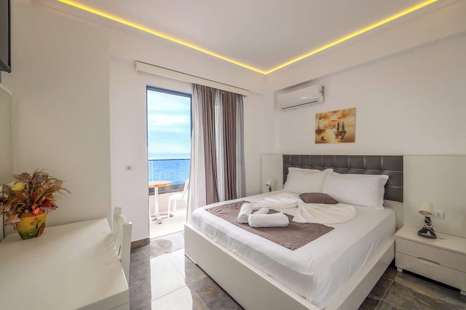 Quadruple Room with Sea View | Desk, free WiFi, bed sheets