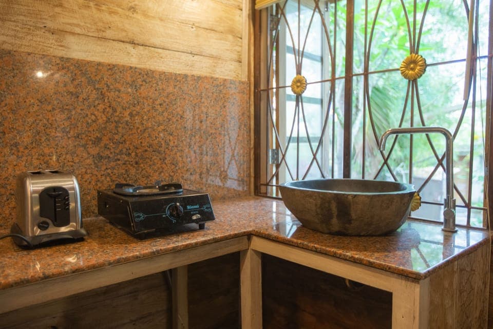 Classic Cabin, 1 King Bed, Garden View, Garden Area | Private kitchen | Shared fridge, electric kettle